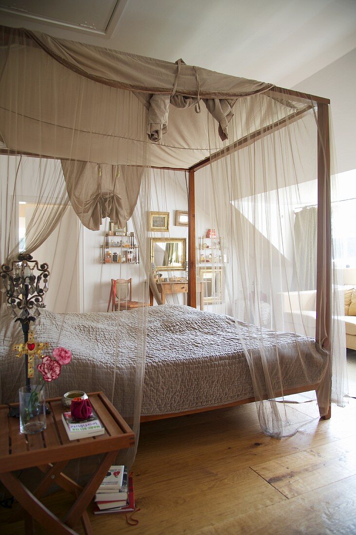 Romantic canopied bed with translucent … – License image – 11216995 ...