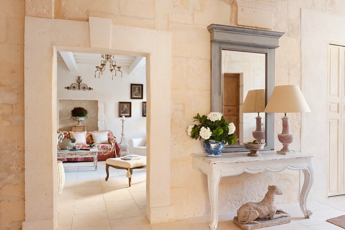 View from foyer in living room of restored, elegant, French country house