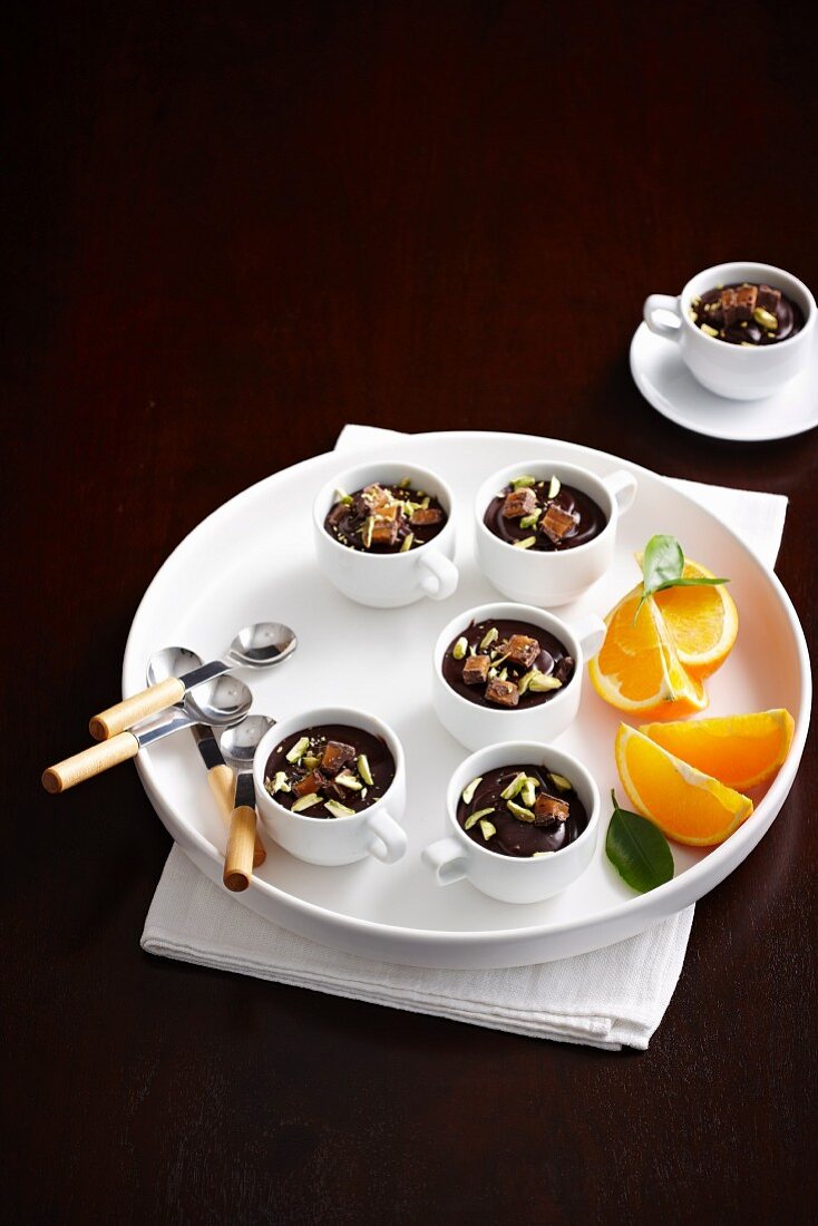 Chocolate mousse with orange liqueur in coffee cups