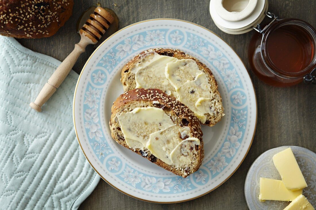 Fruit bread with butter and honey