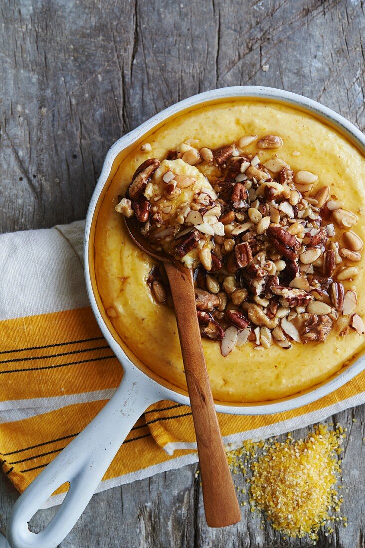 Corn Grits Topped with Toasted Nuts and Honey
