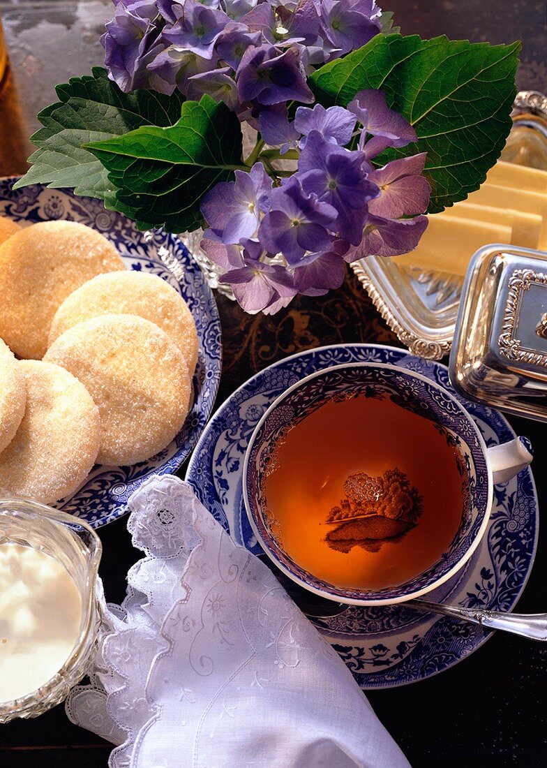 Romantic Tea Scene with Sugar Cookies; Flowers