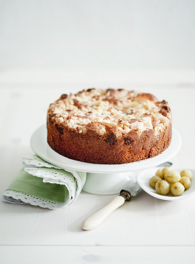 Macadamia nut cake with crumble topping and gooseberries