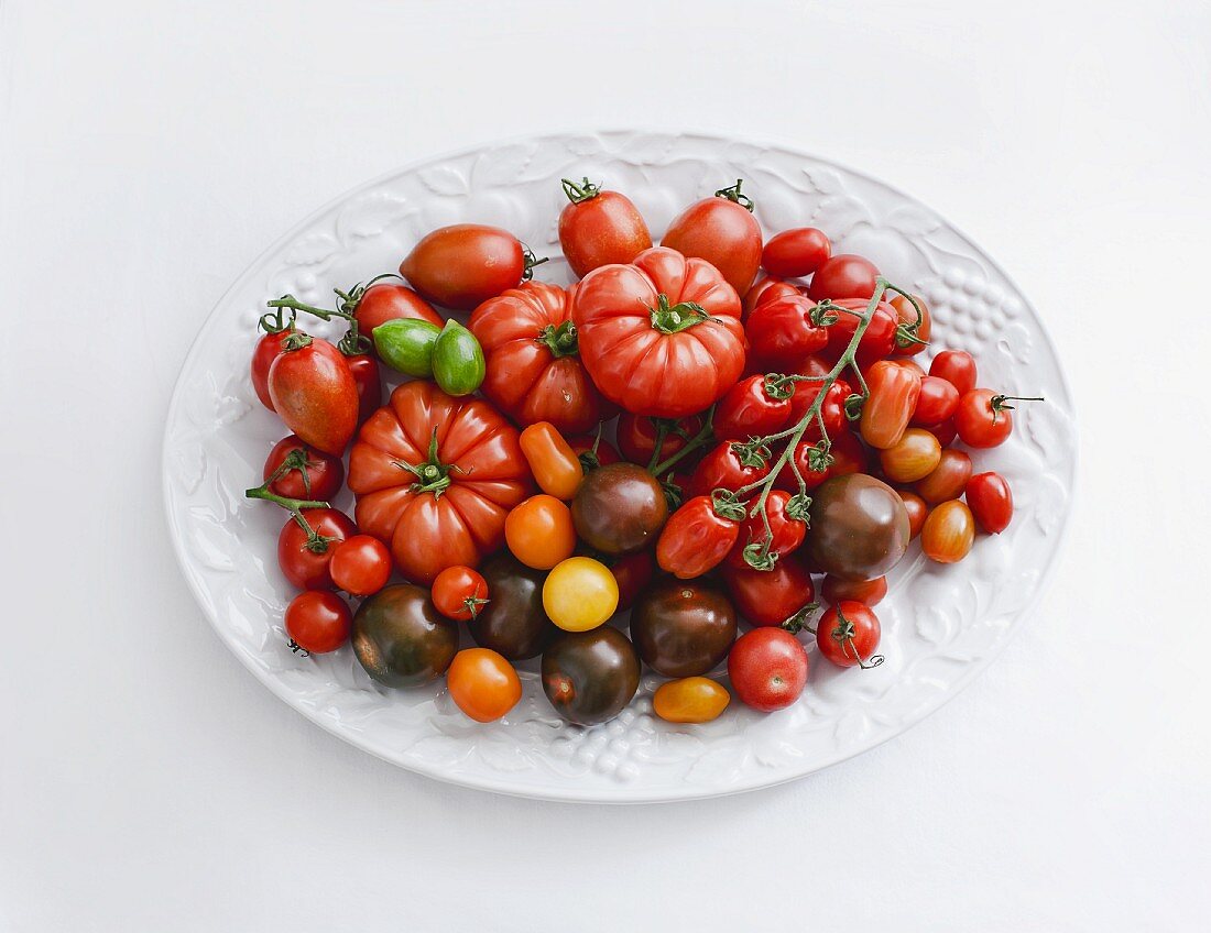 A variety of tomatoes on a plate