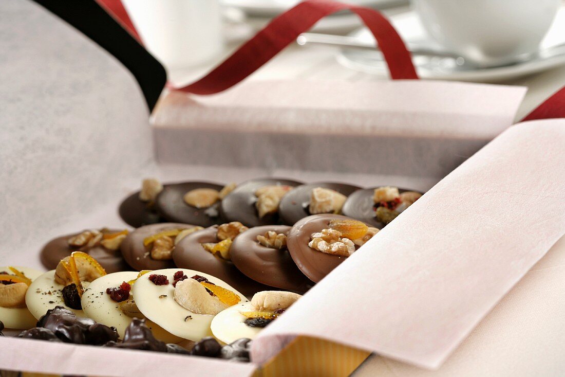 Chocolate cookies with nuts in a present box