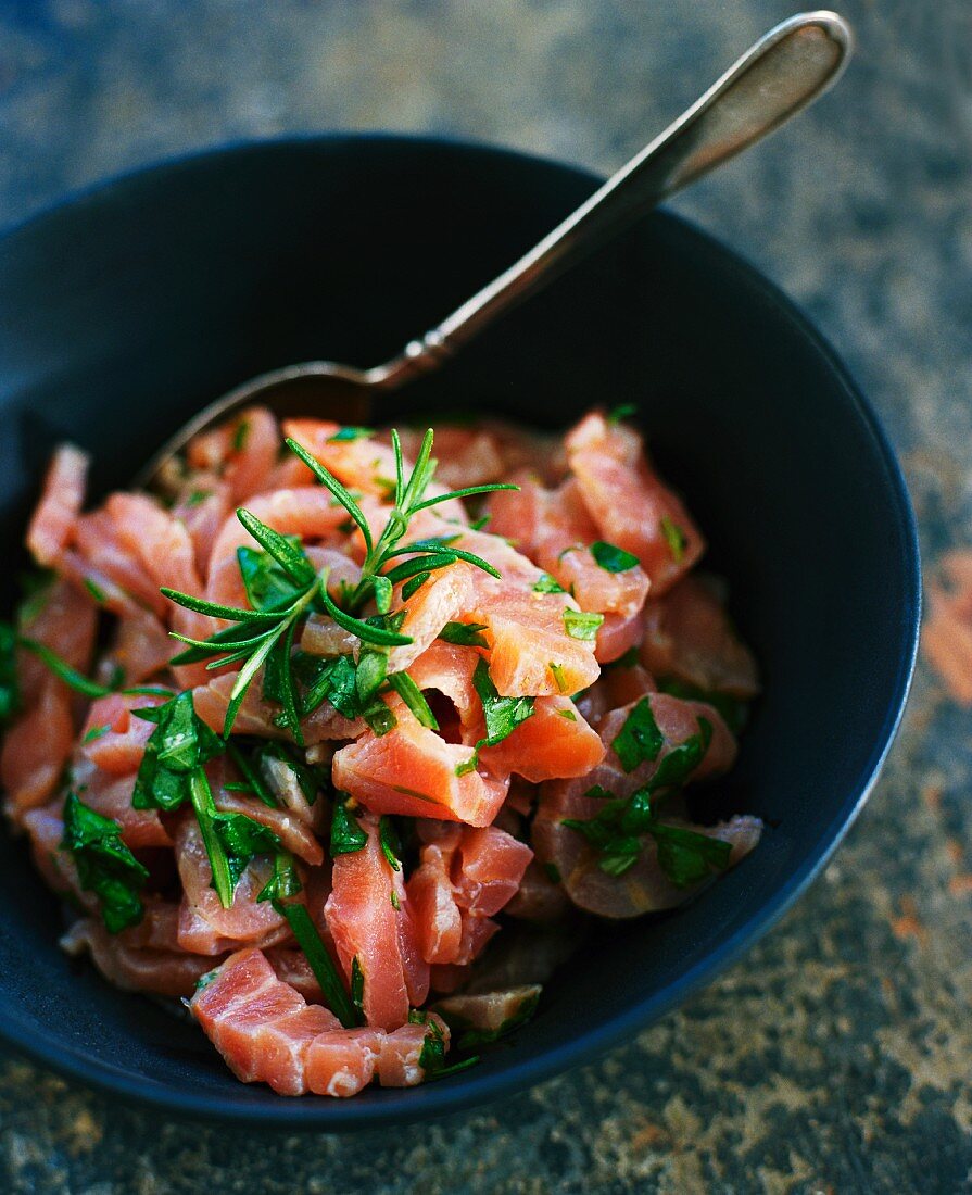 Marinated diced salmon with herbs