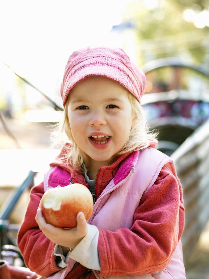 Girl eating apple