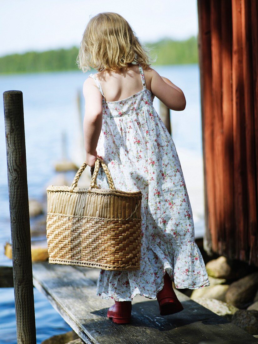 A girl carrying a basket