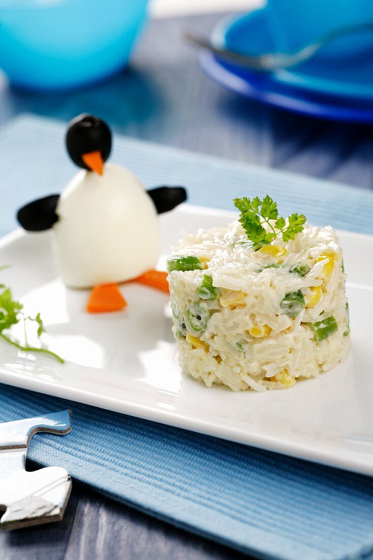 Rice salad with a penguin