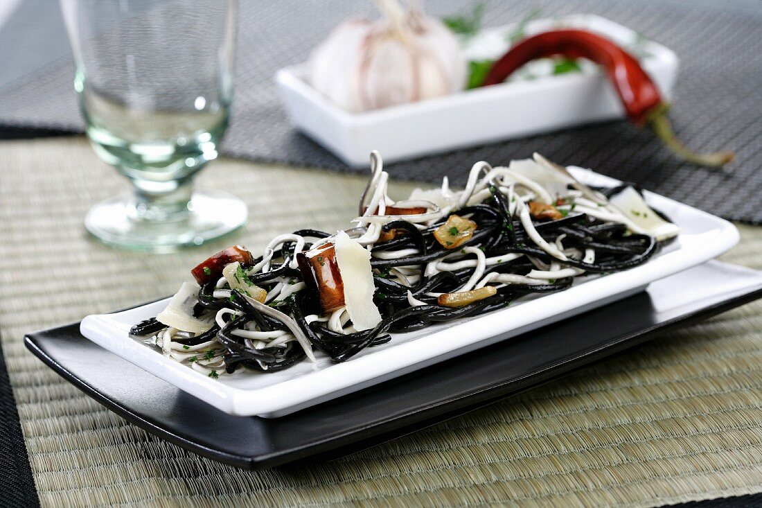 Squid ink spaghetti with parmesan and garlic