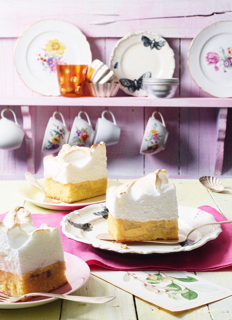 Slices of lime cake topped with coconut meringue