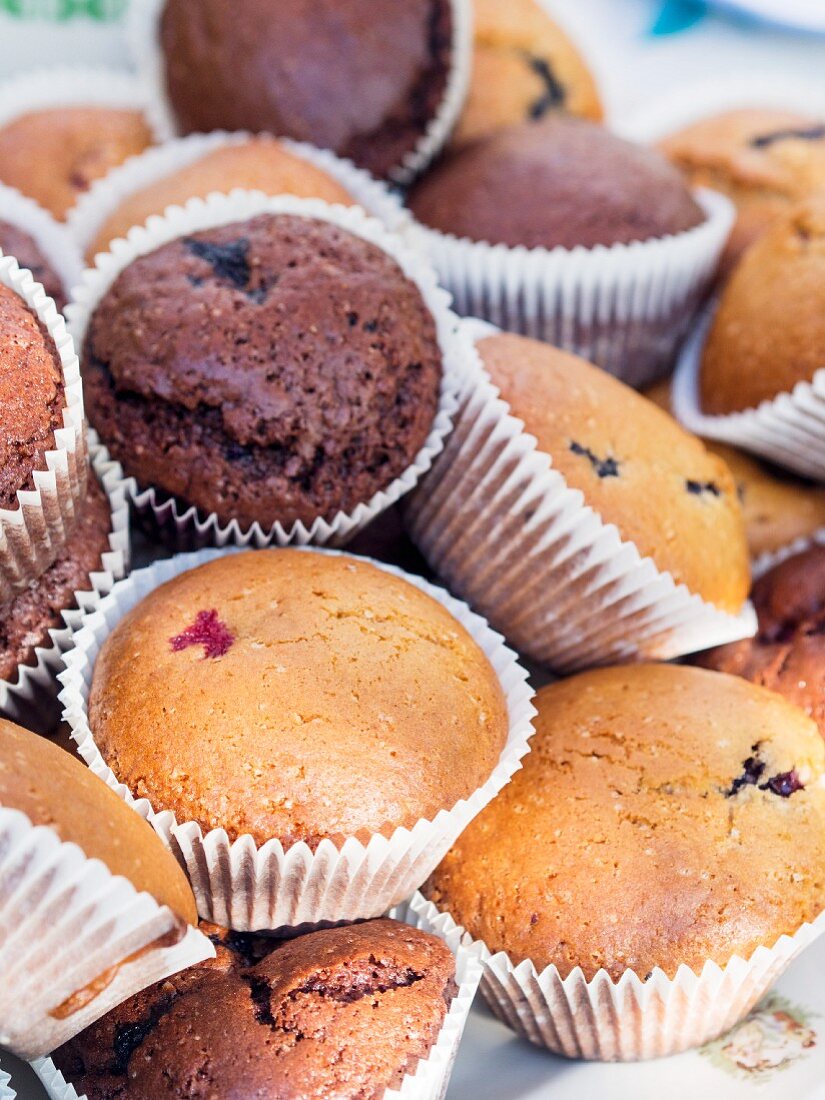 Cupcakes with raspberries and blueberries.