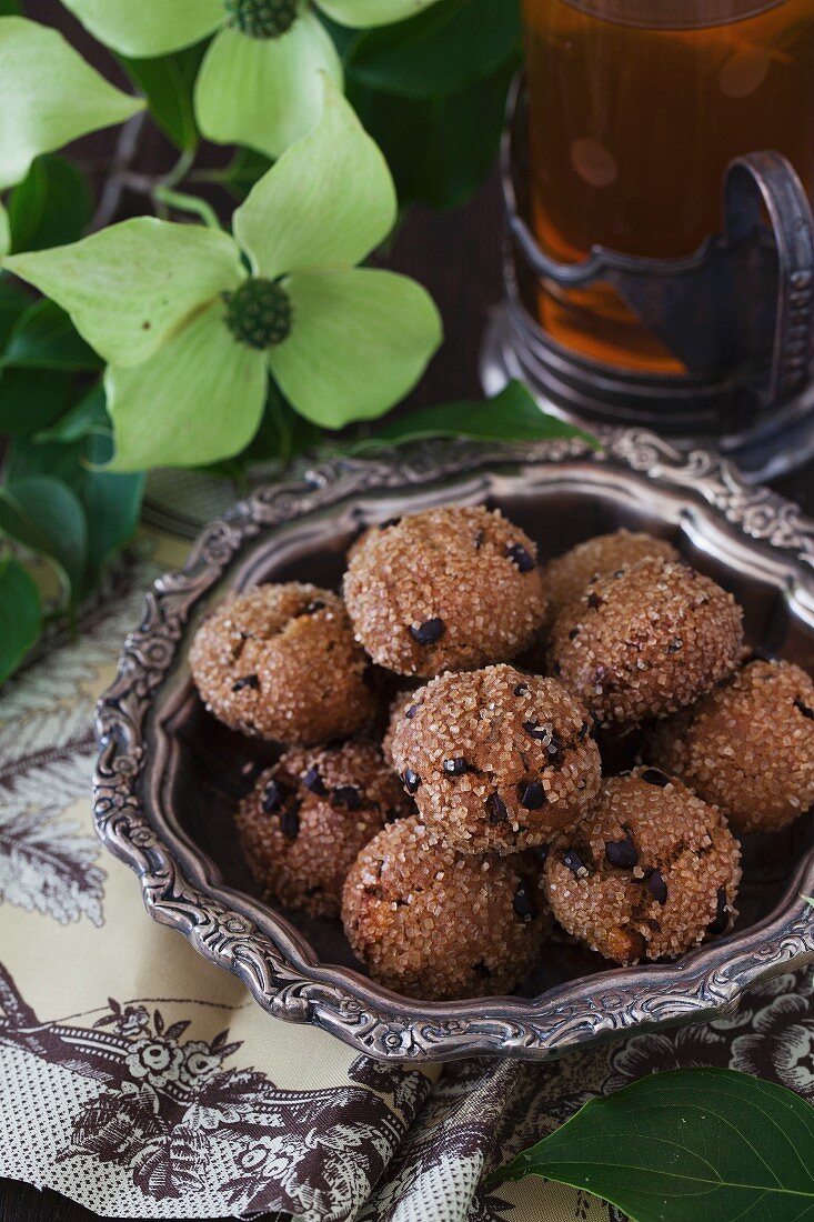 Apricot ginger bites with cocoa nibs and tea