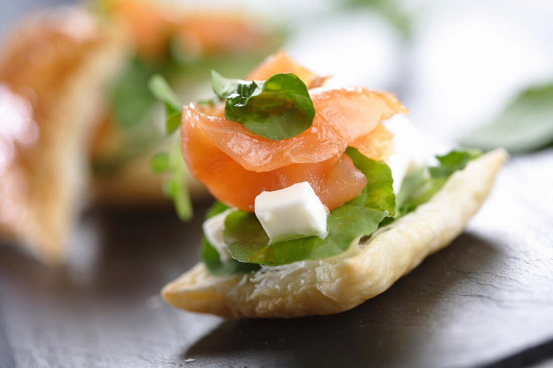 Small puff pastry with salmon