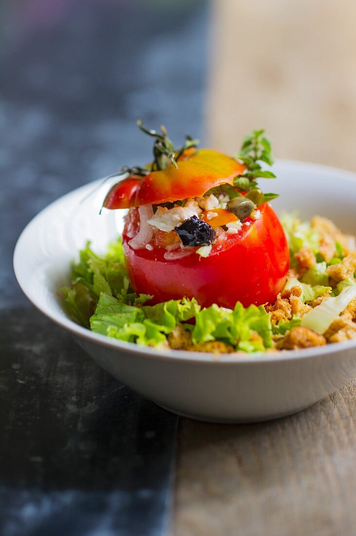 Stuffed tomato with Greek salad