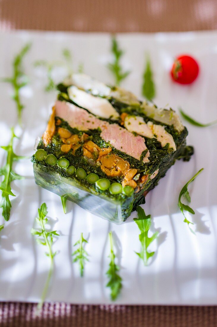Fish terrine with spinach, beans and rocket