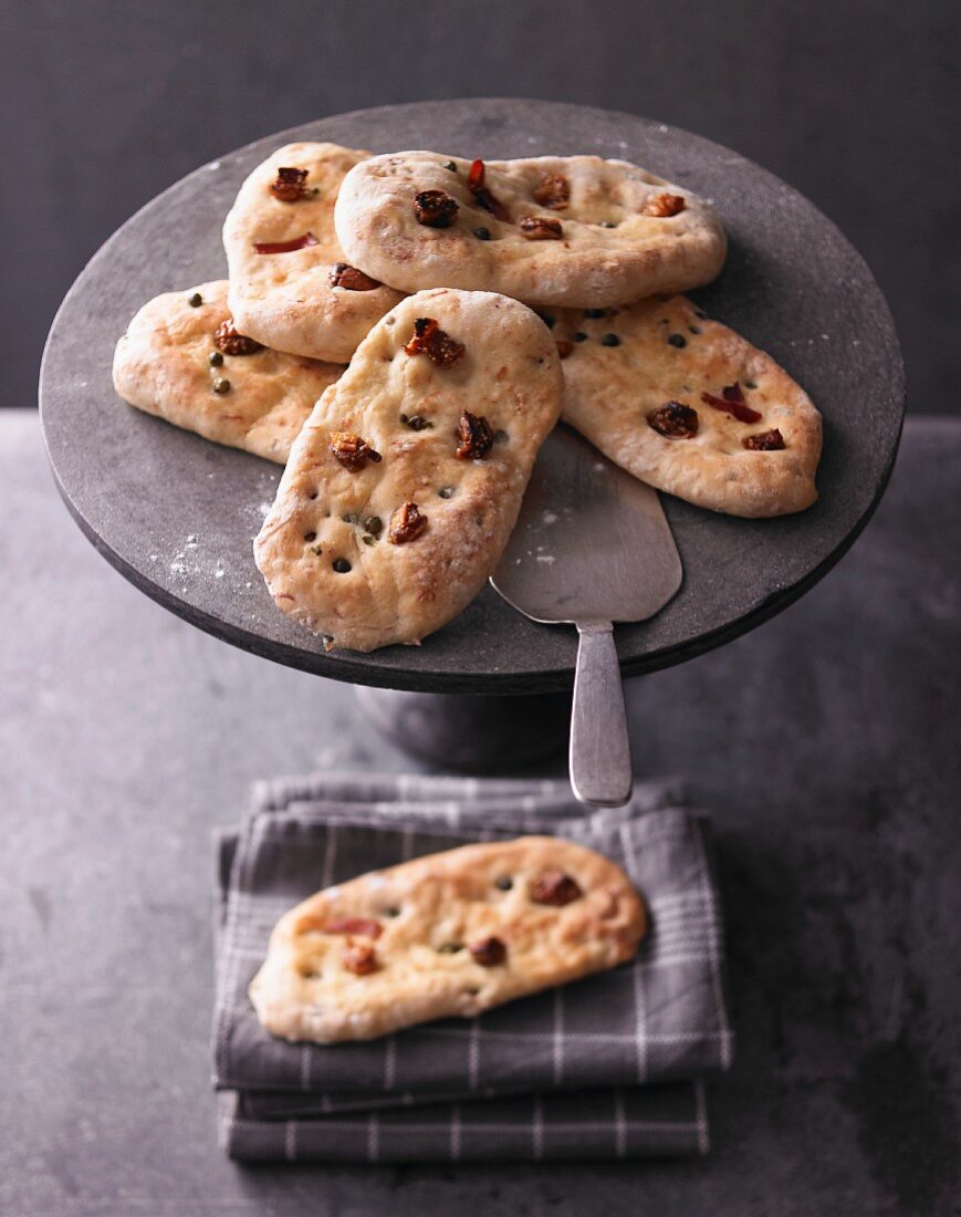 Focaccia with green peppercorns and figs
