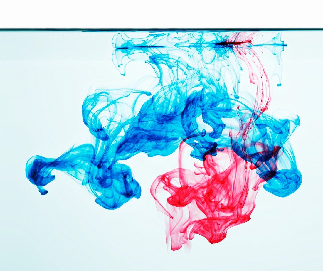 Blue and red ink in water