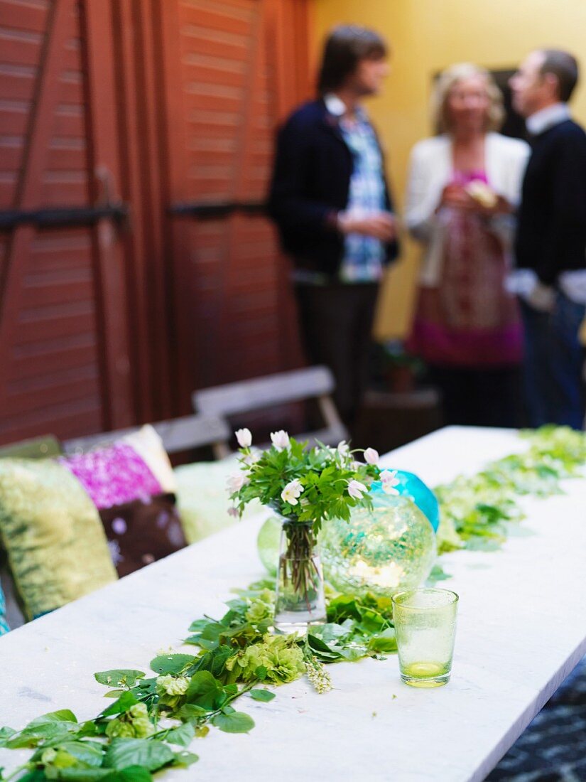 Table decorated with fresh flowers