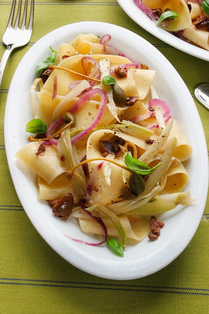 Pappardelle pasta with fennels and olives, Italy