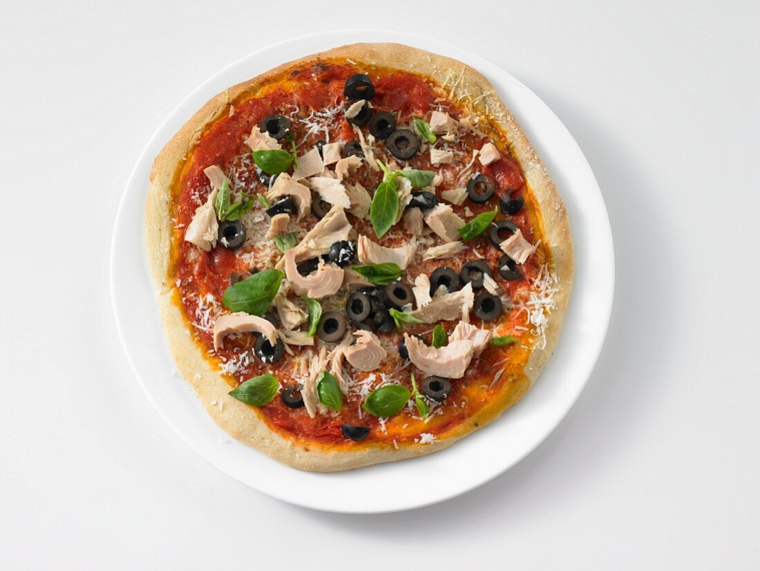 Pizza topped with tuna and olives
