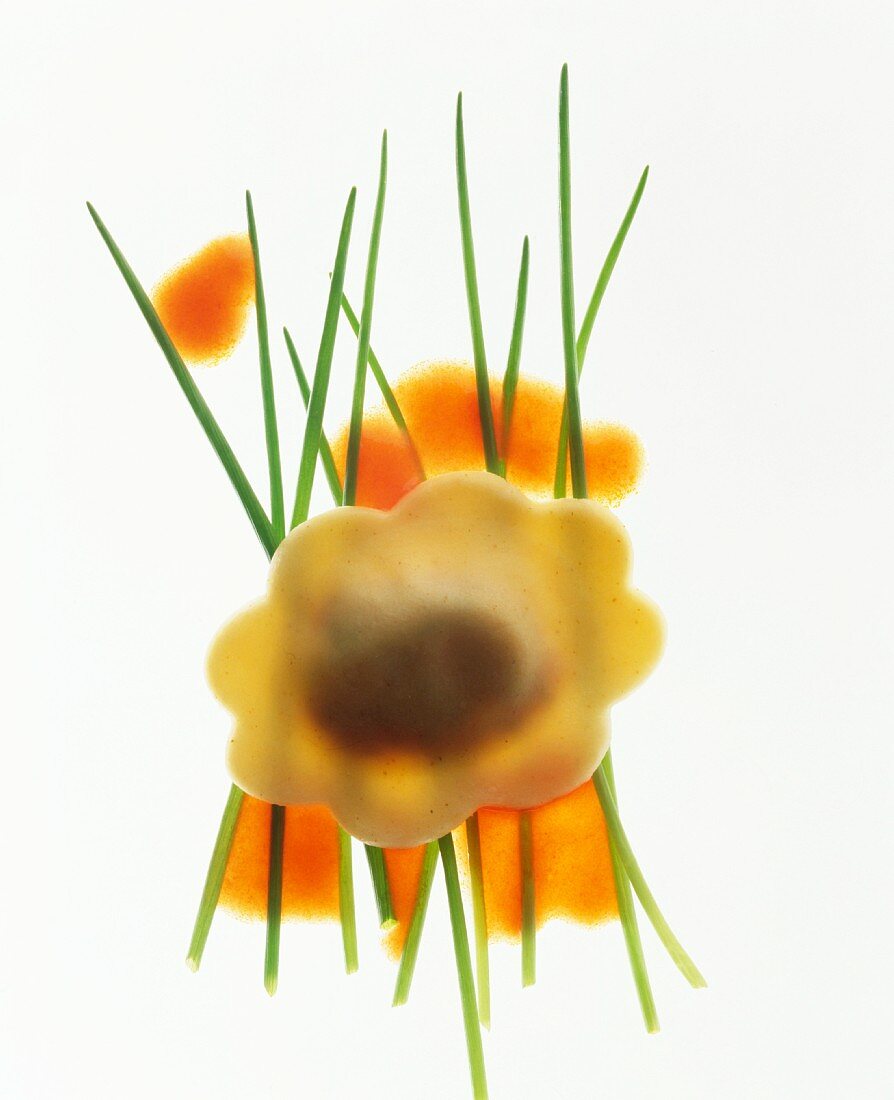 A piece of home-made ravioli against a white background