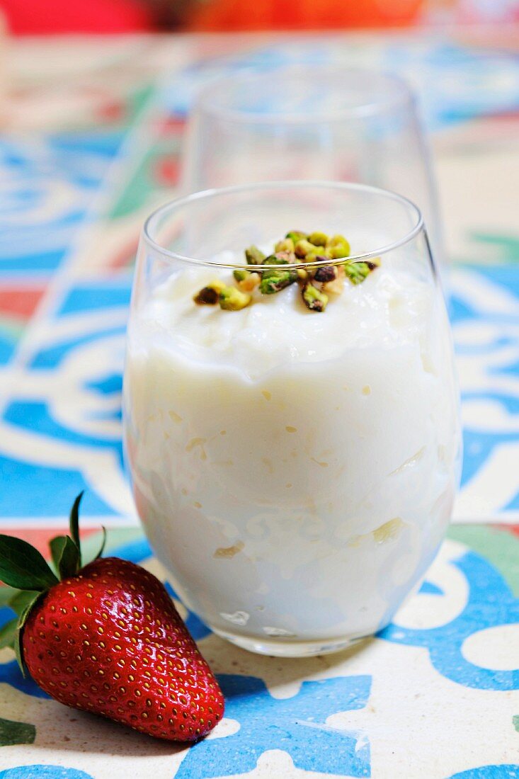 Rice pudding with pistachios (dessert from Egypt)