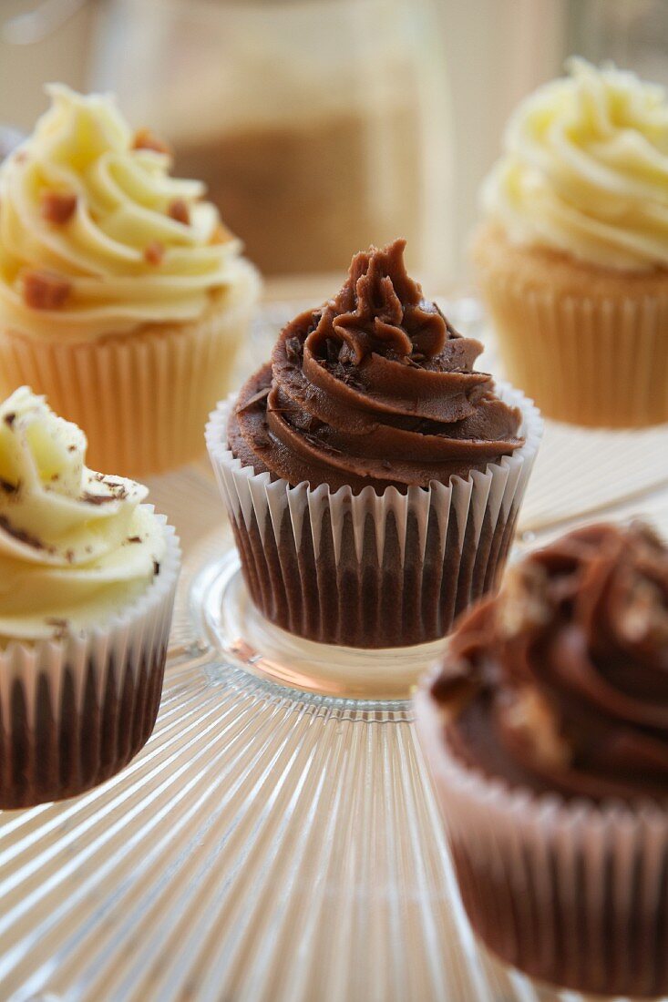 Chocolate, vanilla and caramel cupcakes