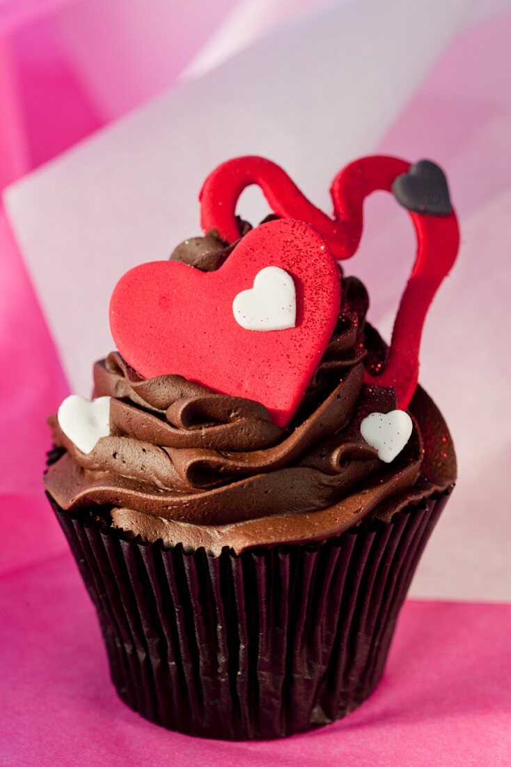 Chocolate cupcake with ganache, buttermilk filling and red hearts