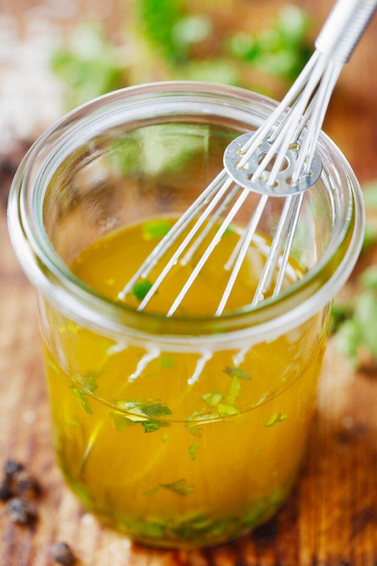 Salad dressing with herbs in a jar