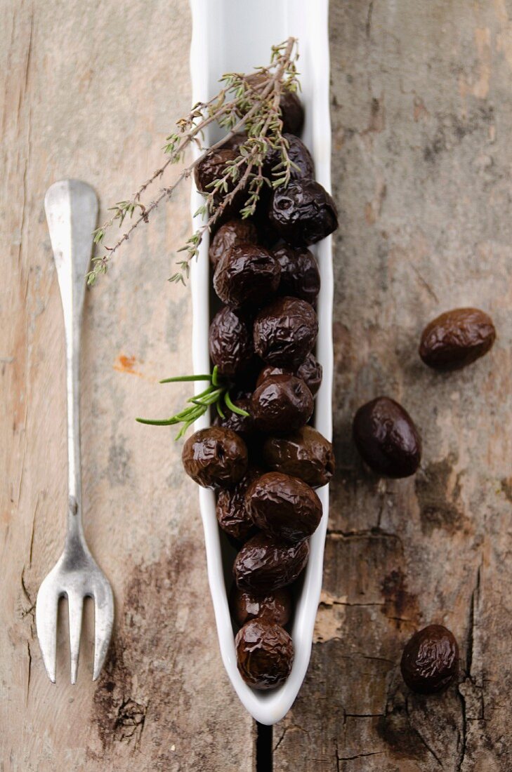 Black olives from Nyons, France, with thyme and rosemary