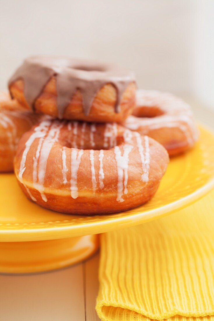 Doughnuts with glacé icing and with chocolate glaze