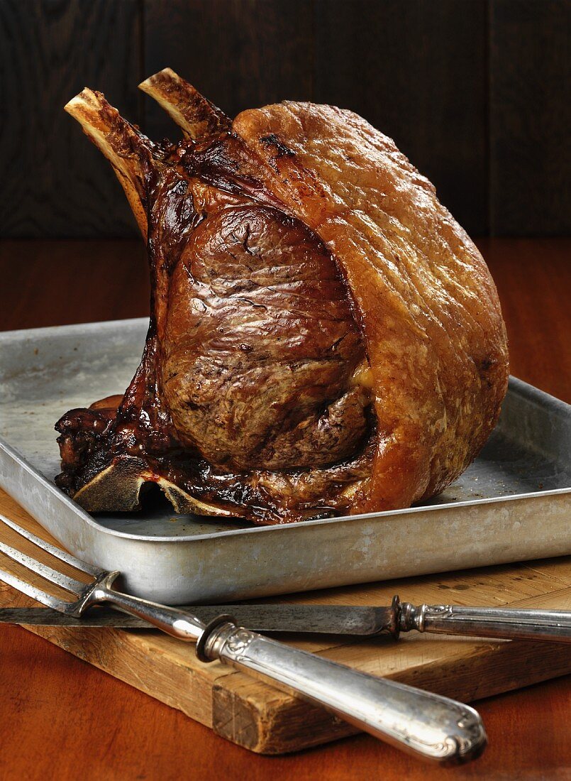 Roast rack of beef in the roasting tin