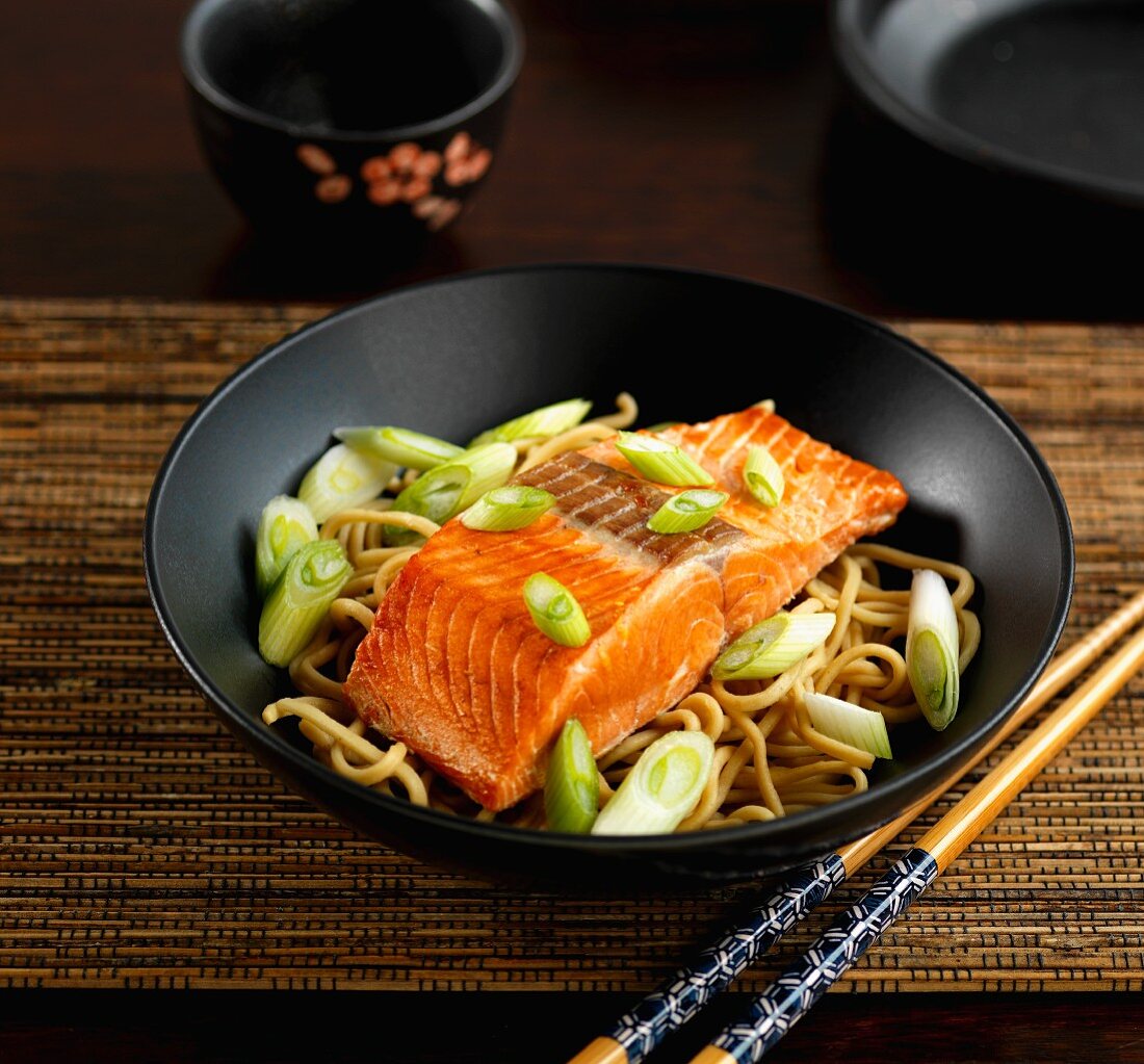 sockeye salmon with egg noodles and spring onions