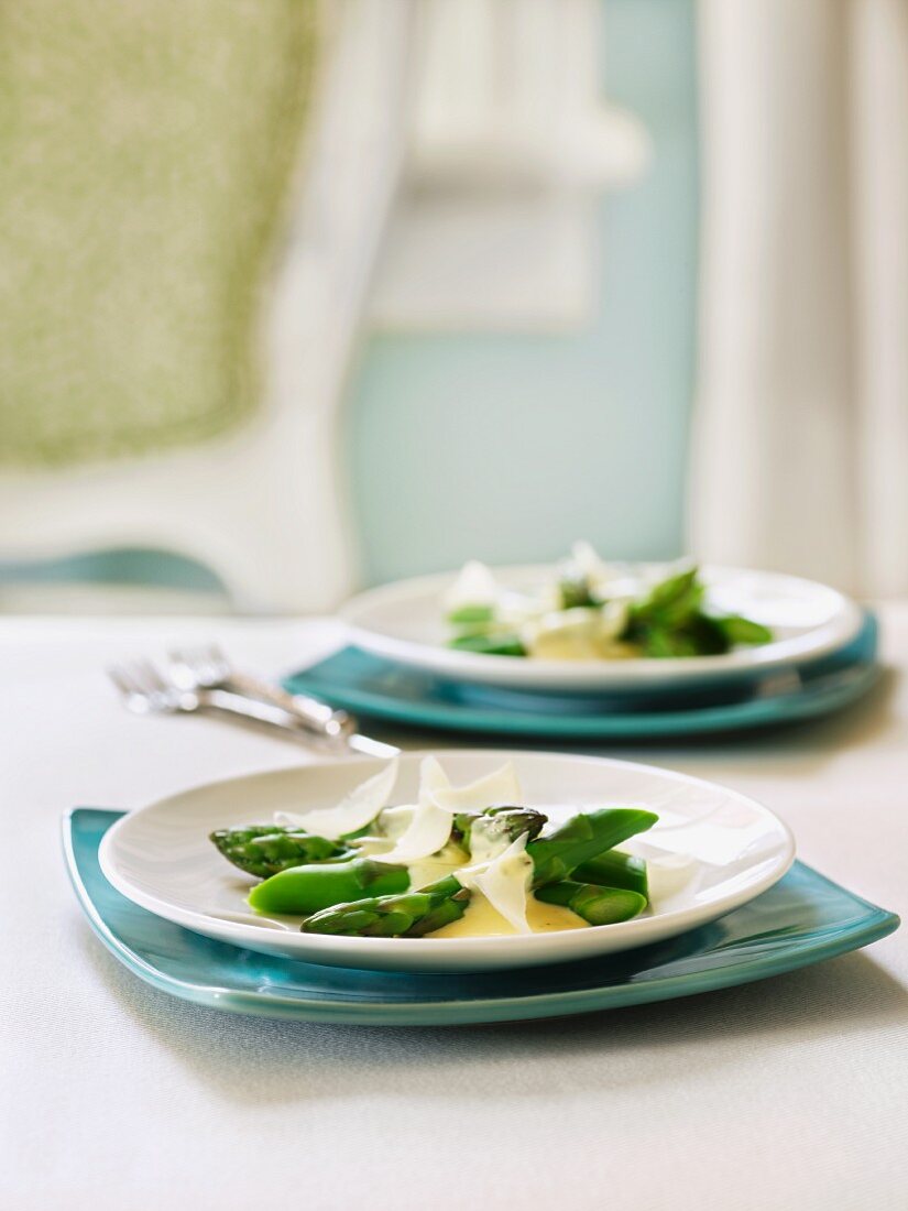 Poached asparagus with hollandaise and parmesan