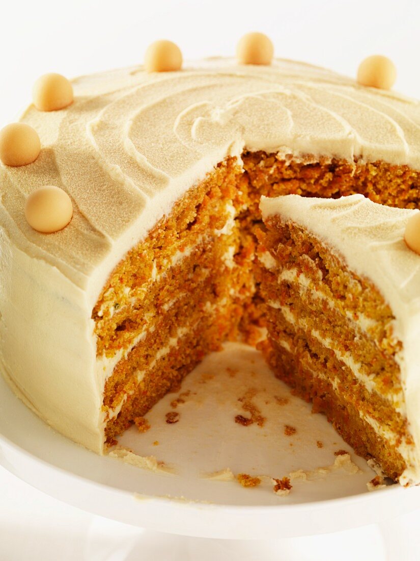 Carrot and nut layer cake, partly slices