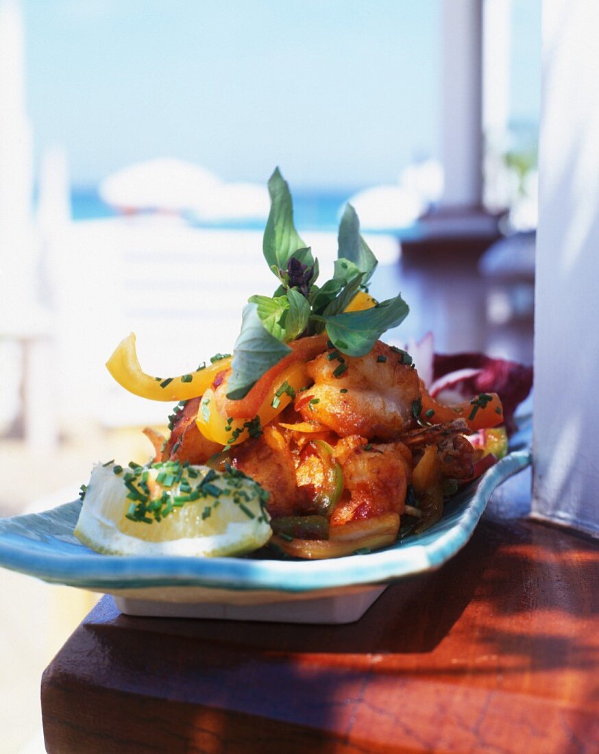 Prawns with peppers, lemon and chives