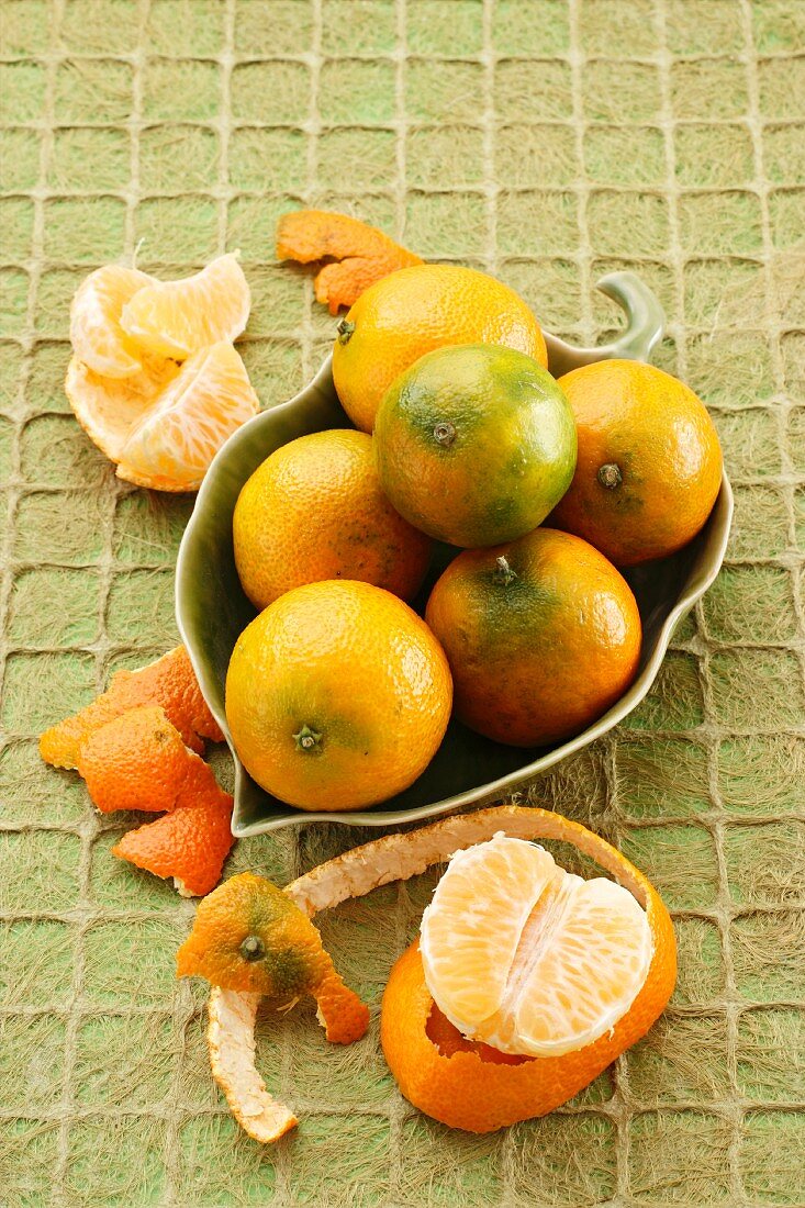 Mandarins in a leaf-shaped bowl