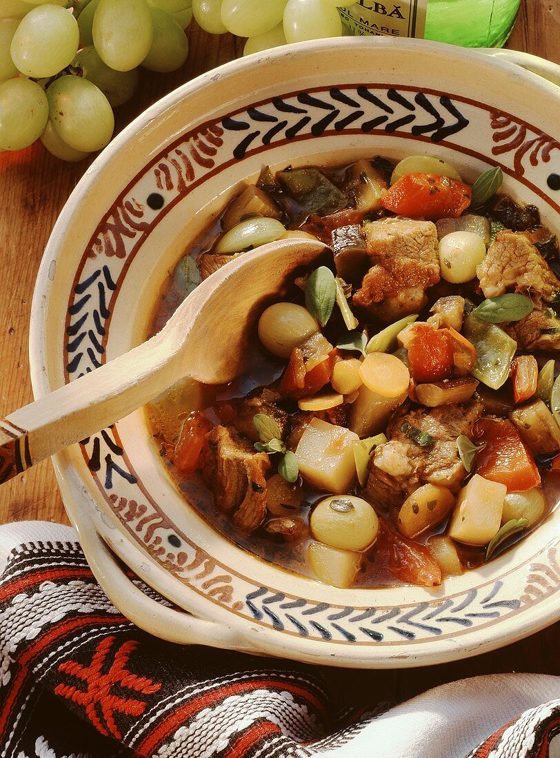 Romanian veal and vegetable stew with grapes