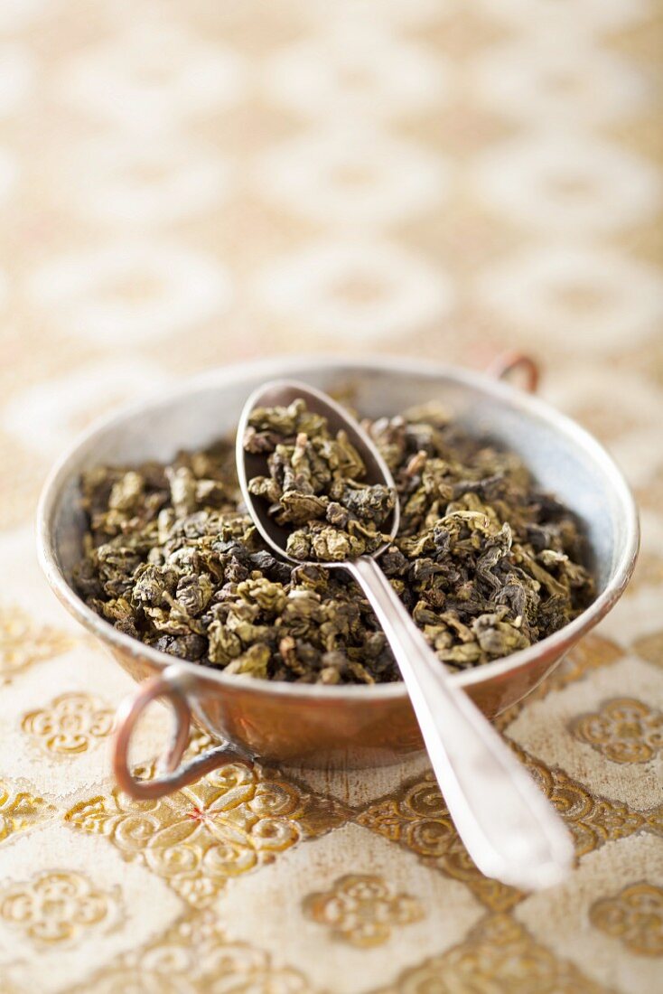 Dried oolong tea in a small bowl