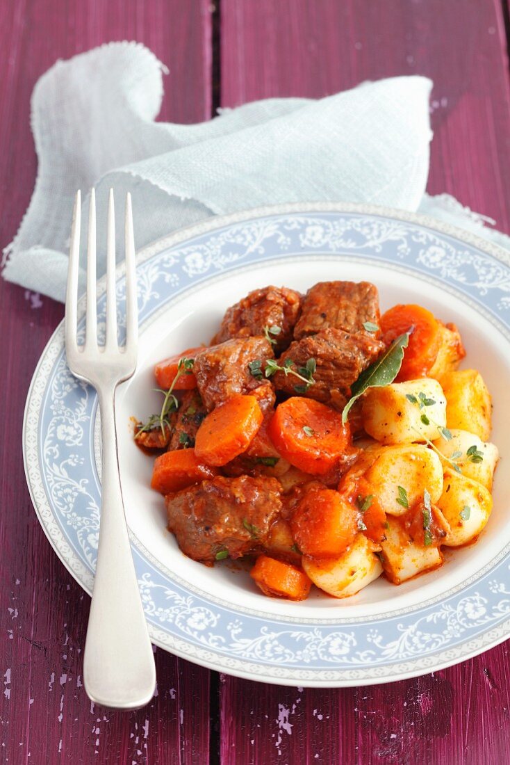 Beef cooked in ale with potato dumplings