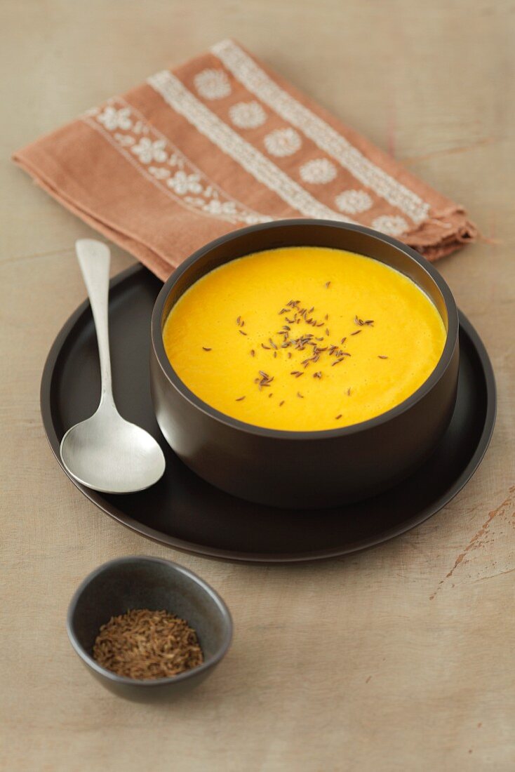 Creamy squash and carrot soup with caraway