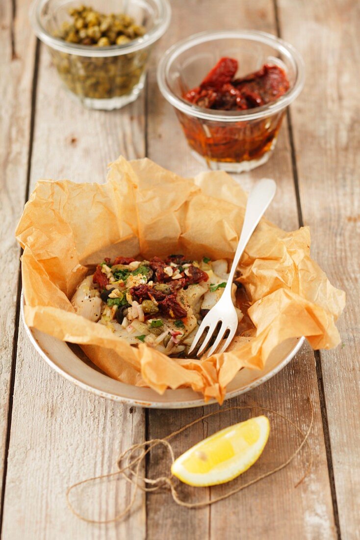 Baked cod with sundried tomatoes and capers