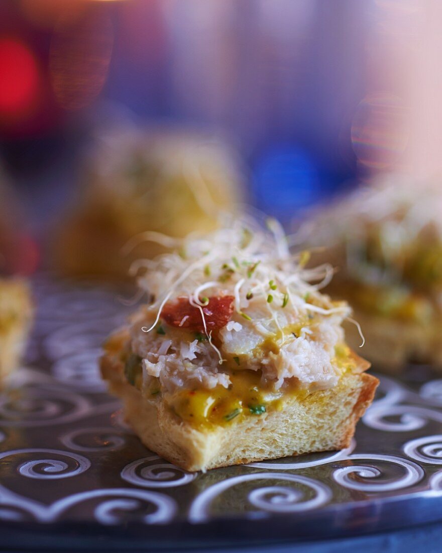 Canapés with crab meat and edible shoots