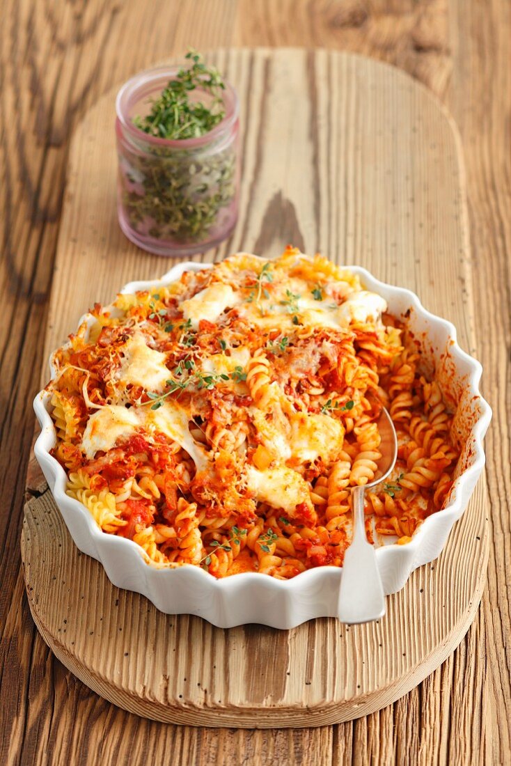 Pasta bake with tomatoes, mozzarella and parmesan