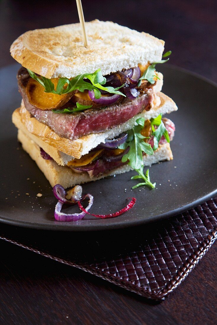 Beef steak, onion and ricotta sandwich