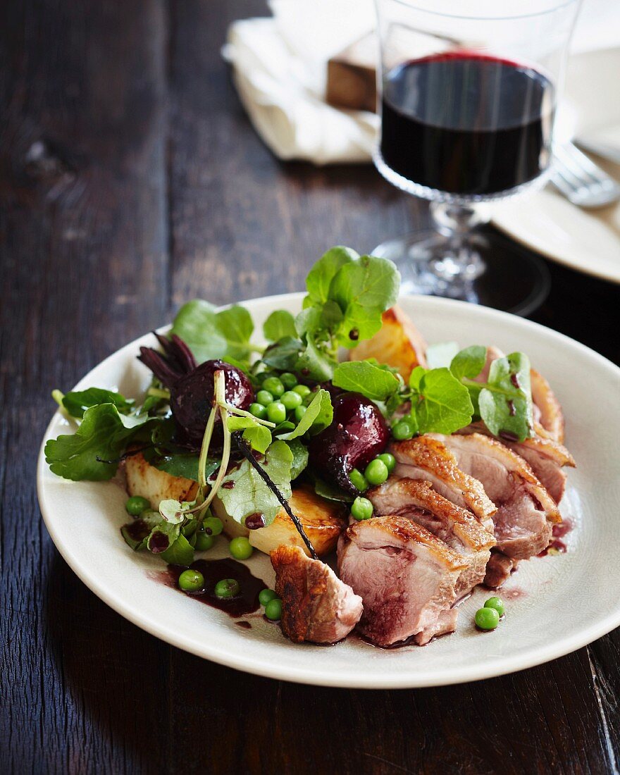 Duck salad with pinot jus and vegetables