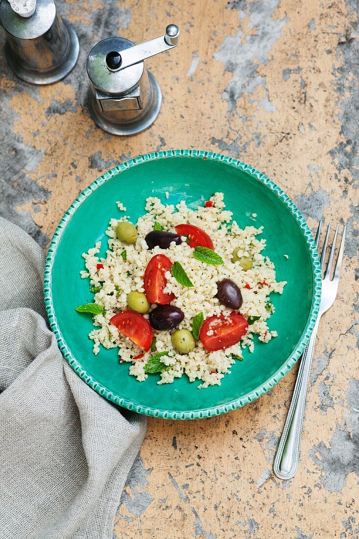 Couscous salad with olives, tomatoes and peppermint
