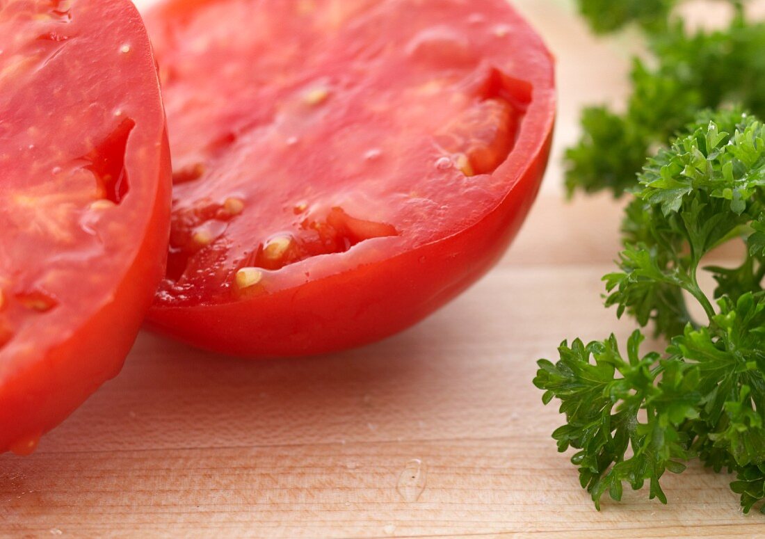 A Tomato cut in half and Parsley