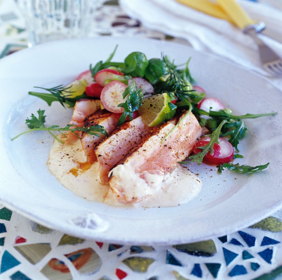 Duck breast with radish and rocket salad